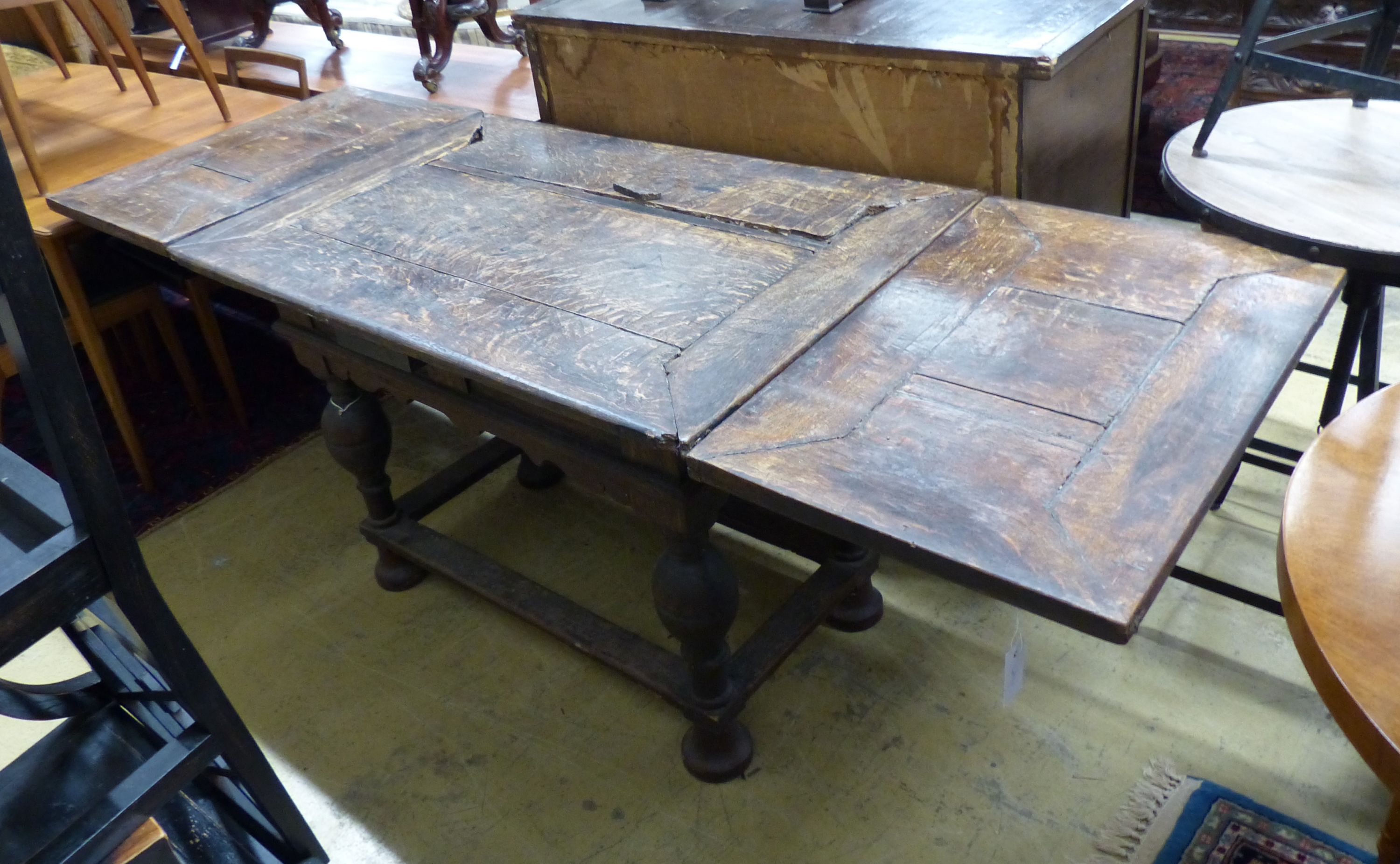 A 19th century Dutch oak extending refectory table, 212cm extended, width 76cm, height 81cm